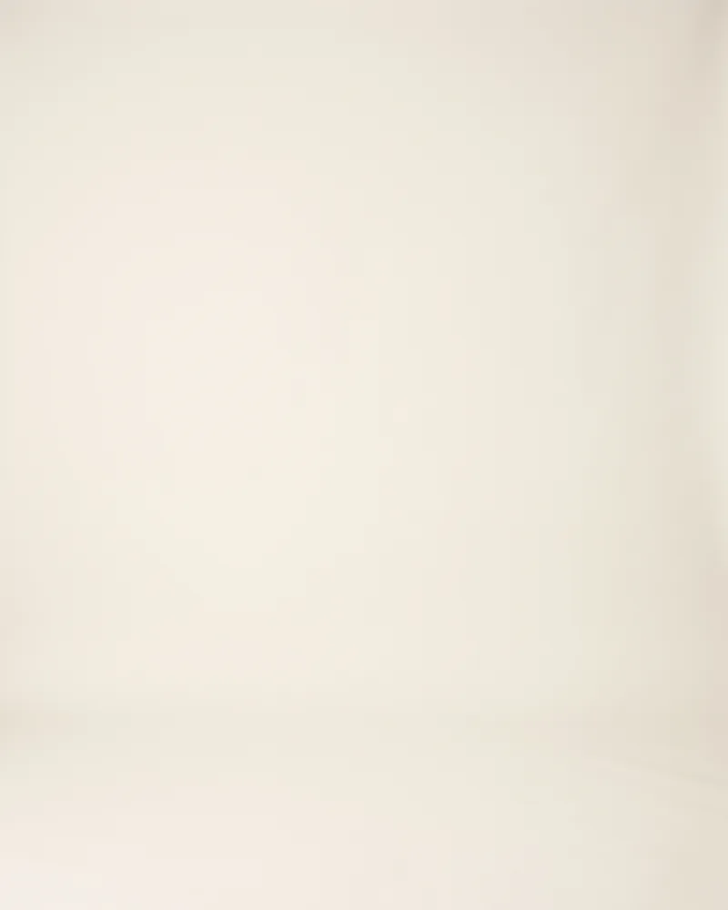 Professional headshot example generated by Staffshots — background option: Off white