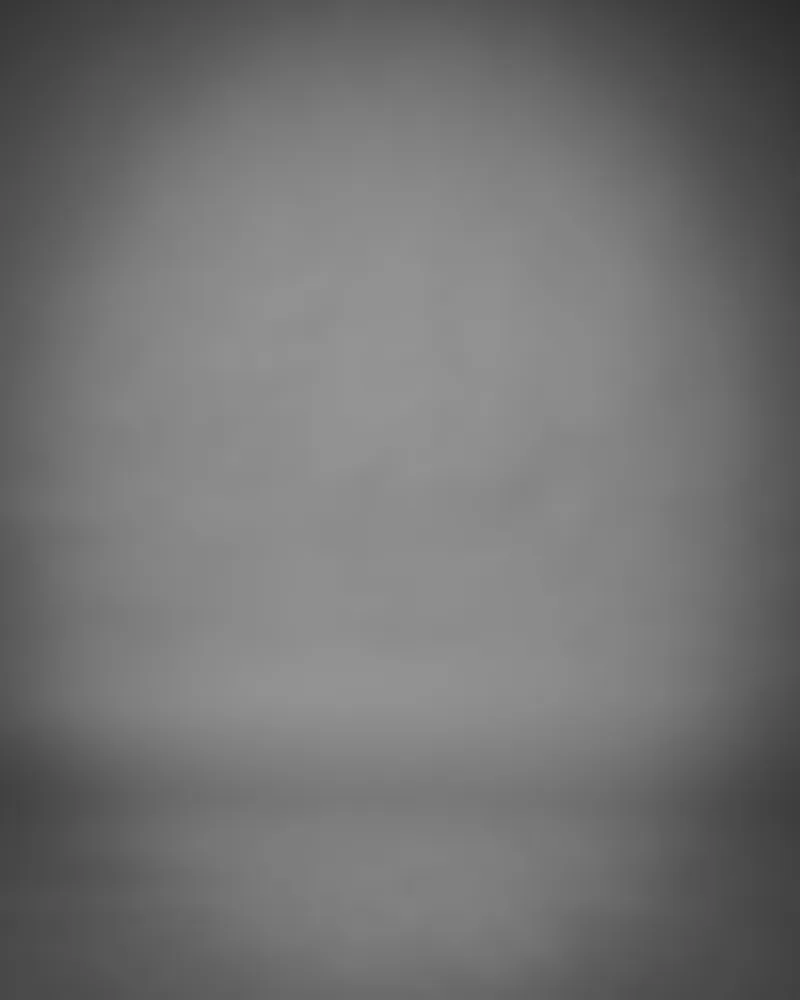 Professional headshot example generated by Staffshots — background option: Studio grey
