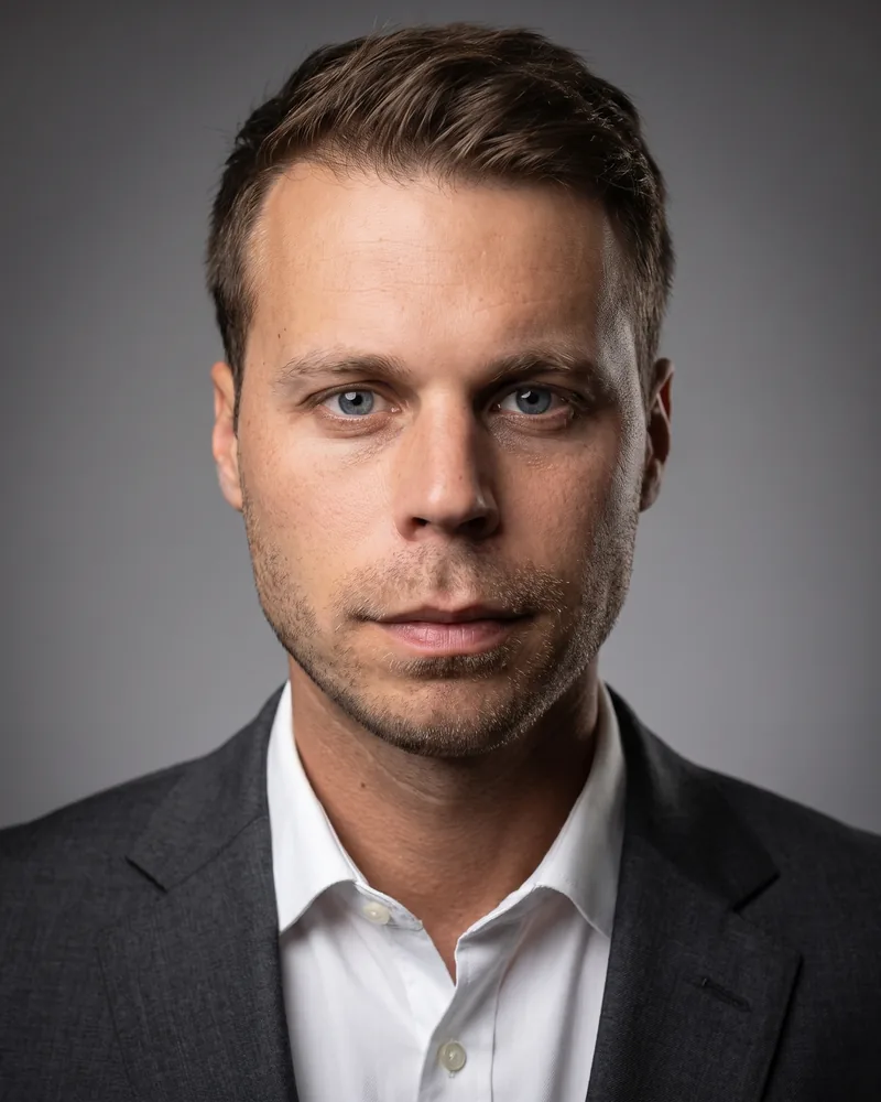 Professional headshot example generated by Staffshots — lighting option: Directional