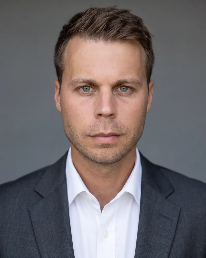 Professional headshot example generated by Staffshots — lighting option: Open shade