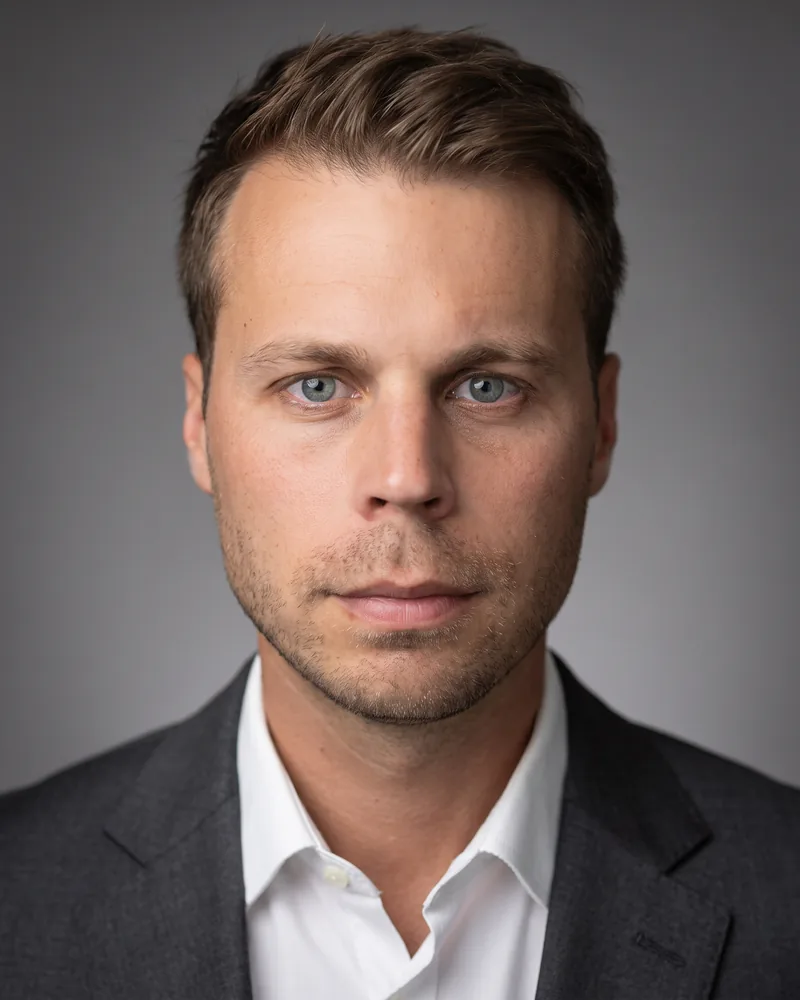 Professional headshot example generated by Staffshots — lighting option: Bright and airy